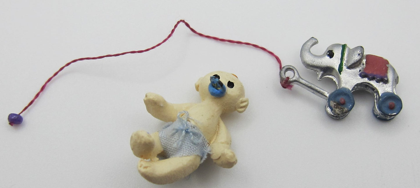 Elephant Pull Toy & A Porcelain Baby Doll PAT1319