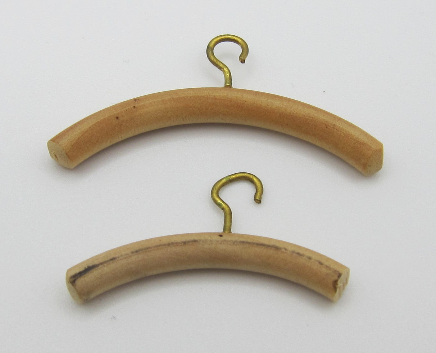A Pair of Wooden Hangers PAT1410