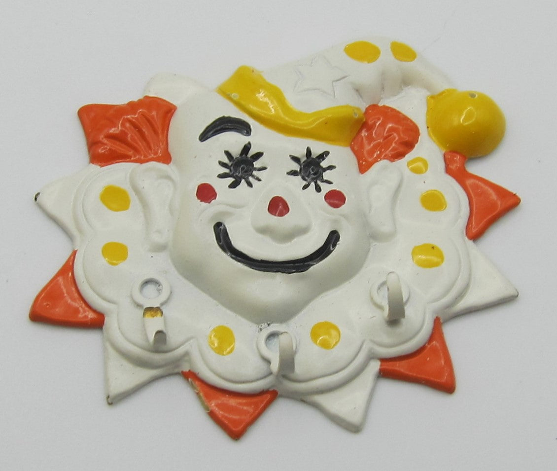 A Clown-Themed Wall Coat-Hanger PAT1656