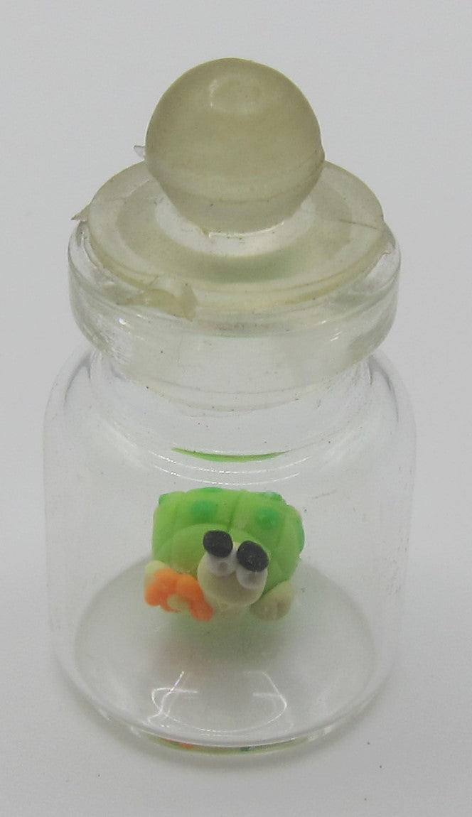 Glass Jar & a Clay Tortoise PAT1675
