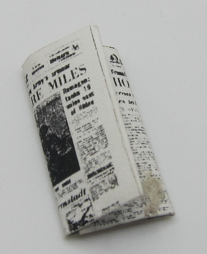 Folded Up Newspaper PAT1710
