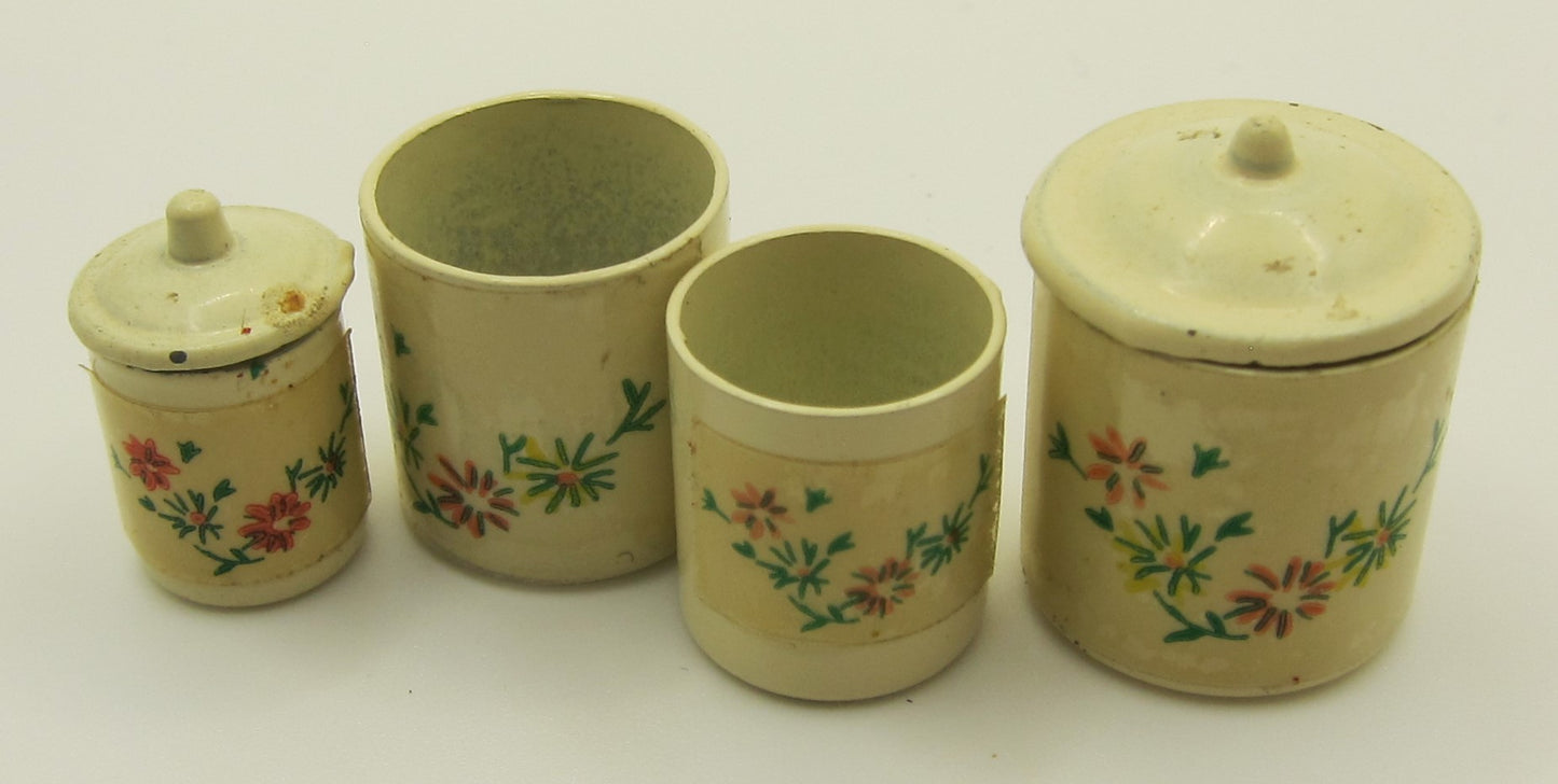 Four Vintage Canisters PAT1887