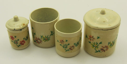 Four Vintage Canisters PAT1887